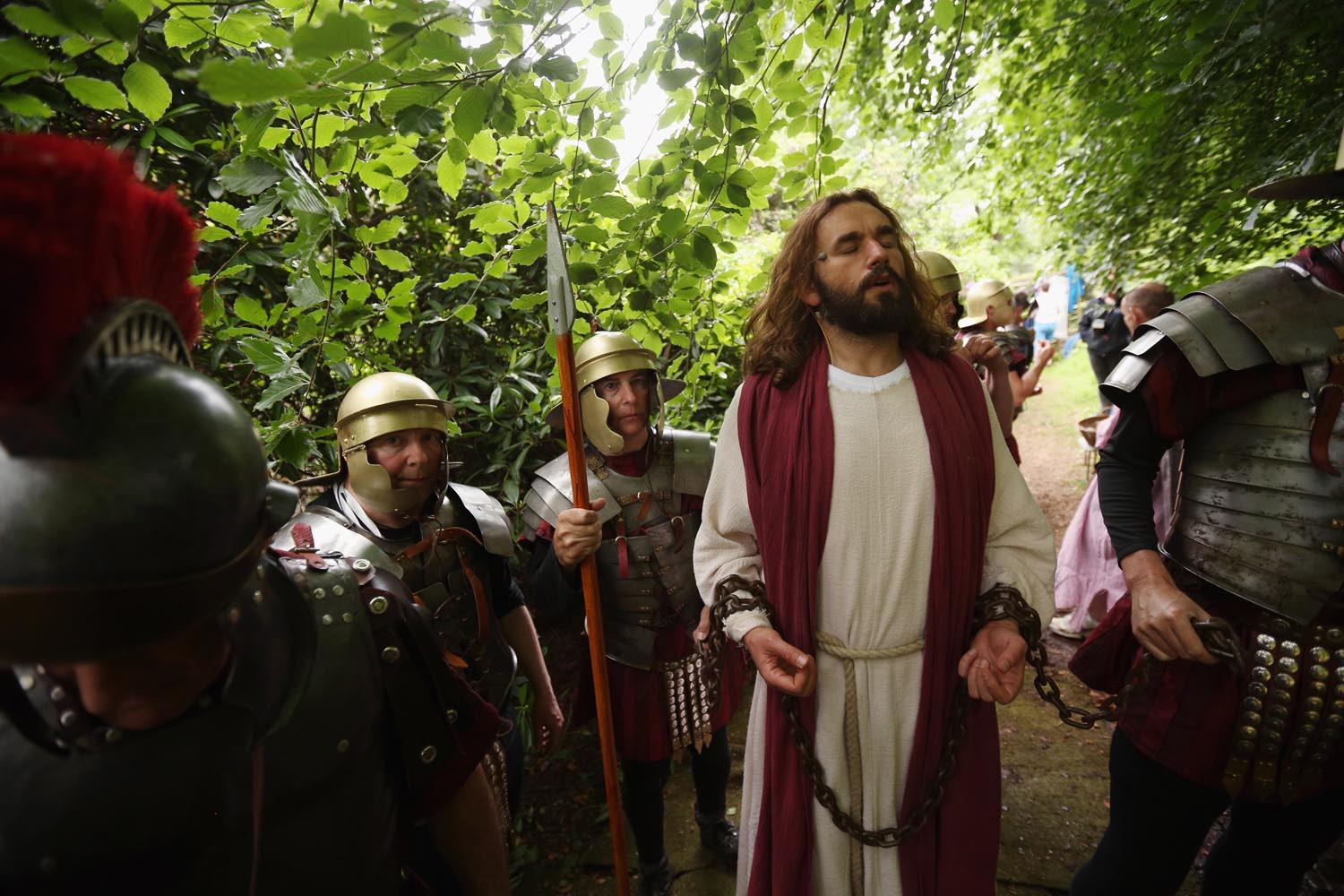 June 24, 2013. Actor James Burke-Dunsmore (C), playing Jesus, waits off stage for his cue during a rehearsal of the 'Life of Christ' at tje Wintershall Estate in Bramley, England.