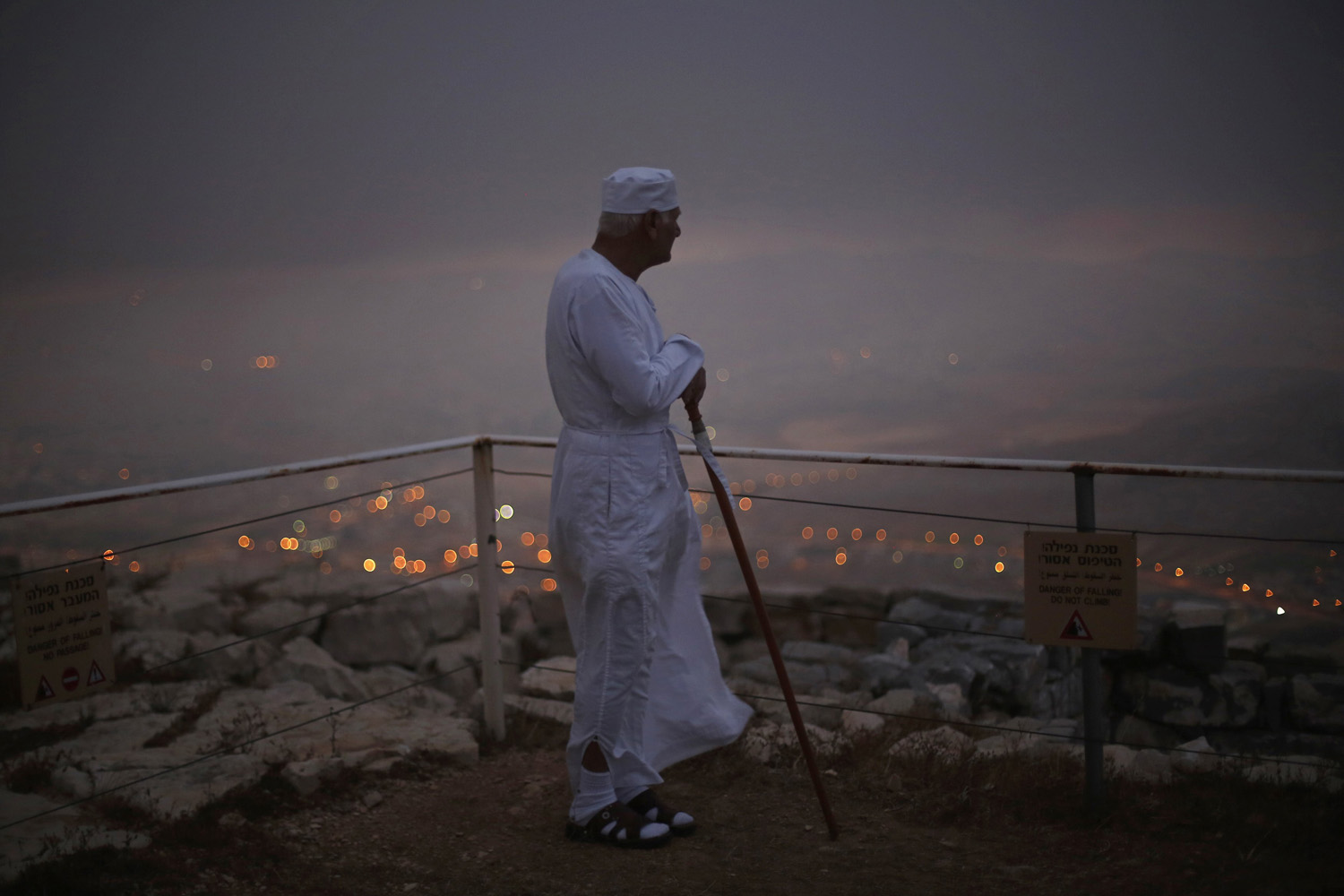 A member of Samaritan sect takes part in traditional pilgrimage marking Shavuot atop Mount Gerizim