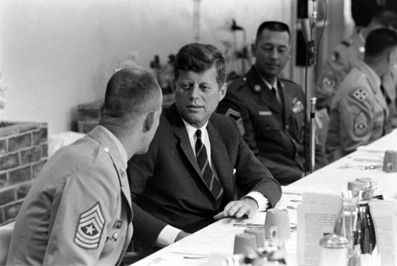 President John F. Kennedy (right) meets with American Army officers during his June 1963 trip to West Germany.
