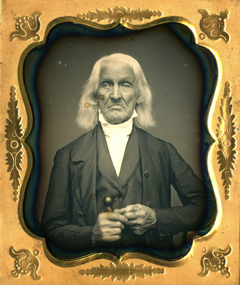 Jonathan Smith, daguerreotype.
                              
                              Jonathan Smith fought in the Battle of Long Island on August 29, 1778. His unit was the first brigade that went out on Long Island, and was discharged in December after a violent snow storm. After the war he became a Baptist minister. He was married three times and had eleven children. The first two wives died and for some reason he left his third wife in Rhode Island to live with two of the children in Massachusetts. On October 20, 1854, he had a daguerreotype taken to give to a granddaughter. He died on January 3, 1855.