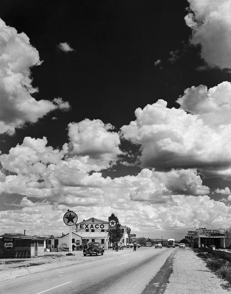 Cumulus clouds billow above a stretch of Route 66 in Arizona, 1947.