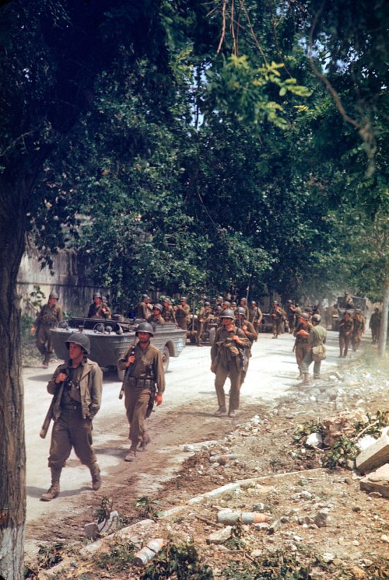 American soldiers march up the Appian Way during the drive towards Rome, WWII.