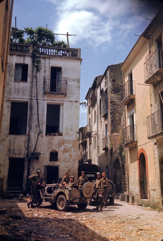 American soldiers rest in a courtyard during the drive towards Rome, World War II.