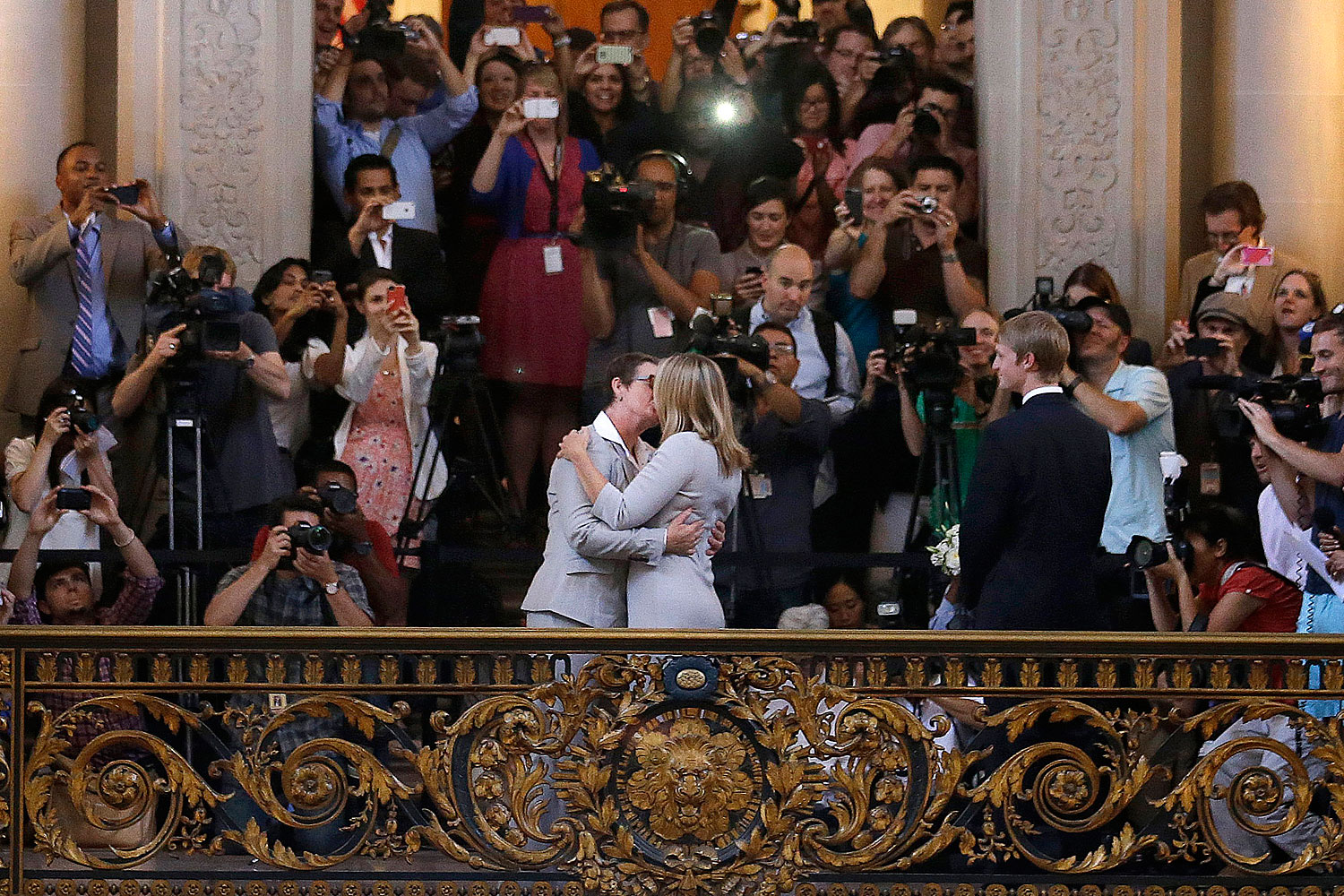Kris Perry, foreground left, kisses Sandy Stier as they are married at City Hall in San Francisco.