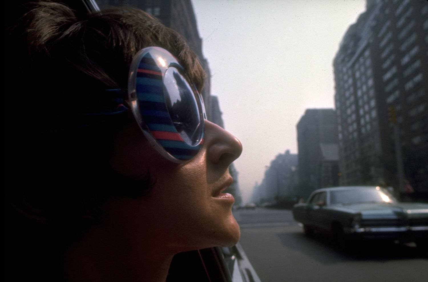 Young woman wearing fashionable sunglasses, New York, summer 1969.