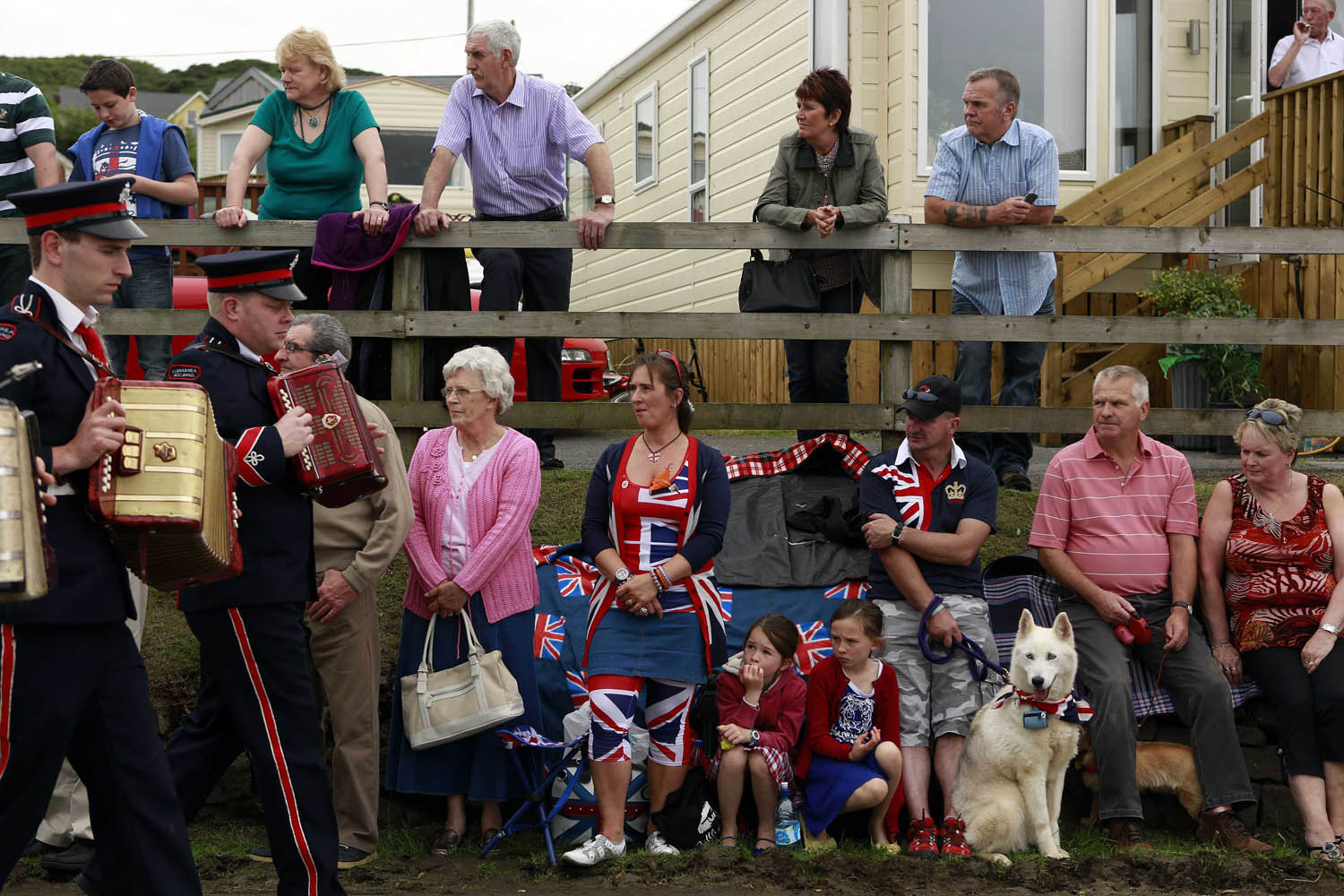 Spectators watch an Orange Order parade at Rossnowlagh Strand in County Donegal.