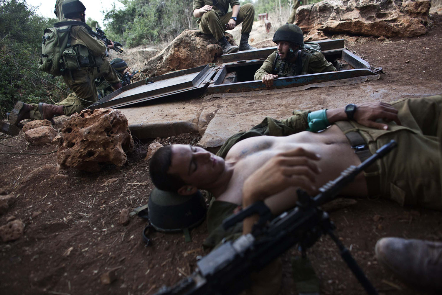 Israeli soldiers take part in drill simulating a battle with Hezbollah in a mock village at base near Haifa