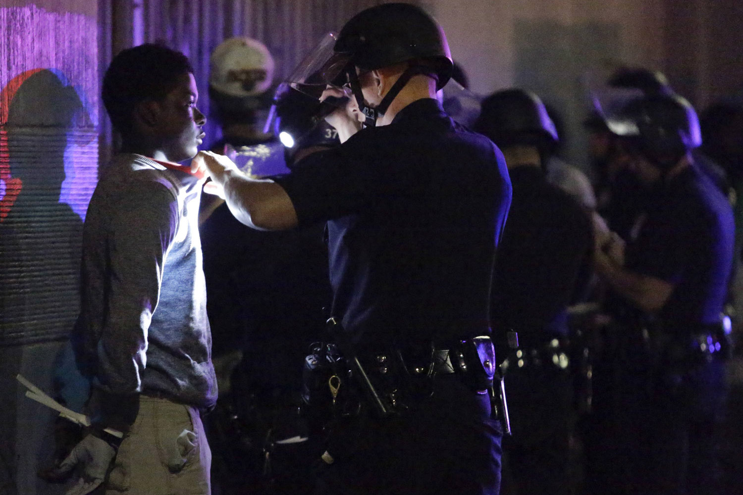July 15, 2013. Los Angeles police arrest about a dozen people after a peaceful protest supporting Trayvon Martin turned unlawful in the Leimert Park neighborhood Los Angeles, Calif.