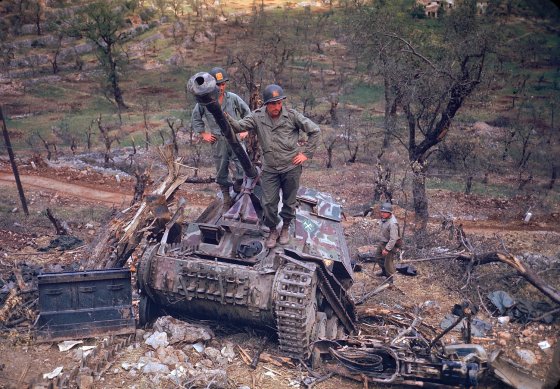 American troops look over German armor destroyed during the drive towards Rome, 1944.