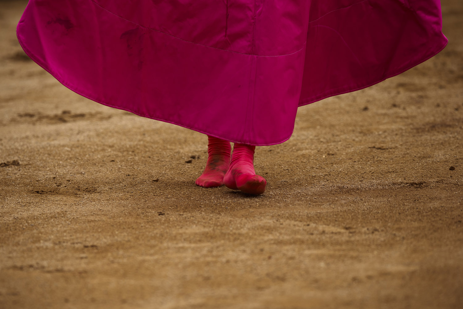 July 14, 2013. Spanish bullfighter Jimenez Fortes performs with out shoes during a bullfight of the San Fermin festival, in Pamplona, Spain.