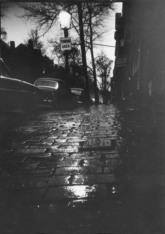 Beacon Hill street at dusk has eerie aspect during wave of Boston stranglings, 1963.