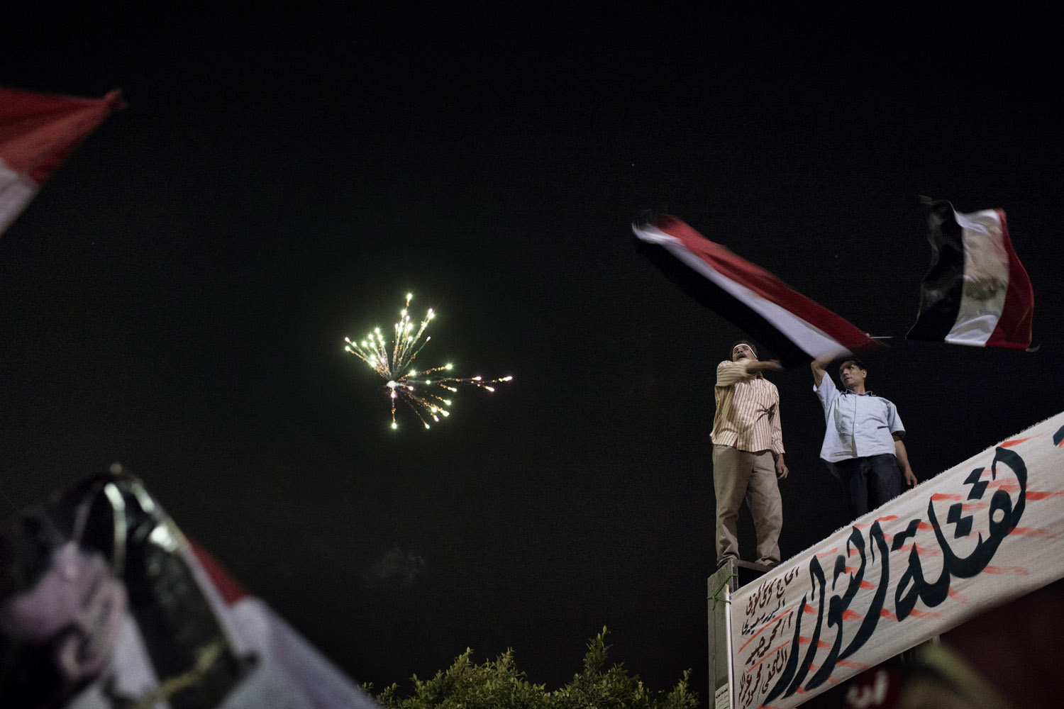 July 7, 2013. Opponents of Egypt's ousted President Mohamed Morsi celebrate and rally in Tahrir Square.