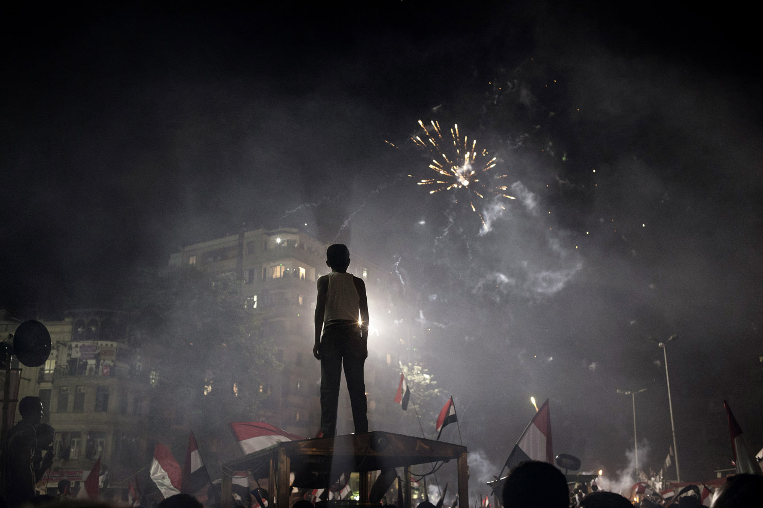 July 3, 2013. Fireworks light the sky after massive demonstrations turned to celebration in and around Tahrir Square, Cairo, as Egyptian President Mohamed Morsi was ousted by the military and taken into custody.
