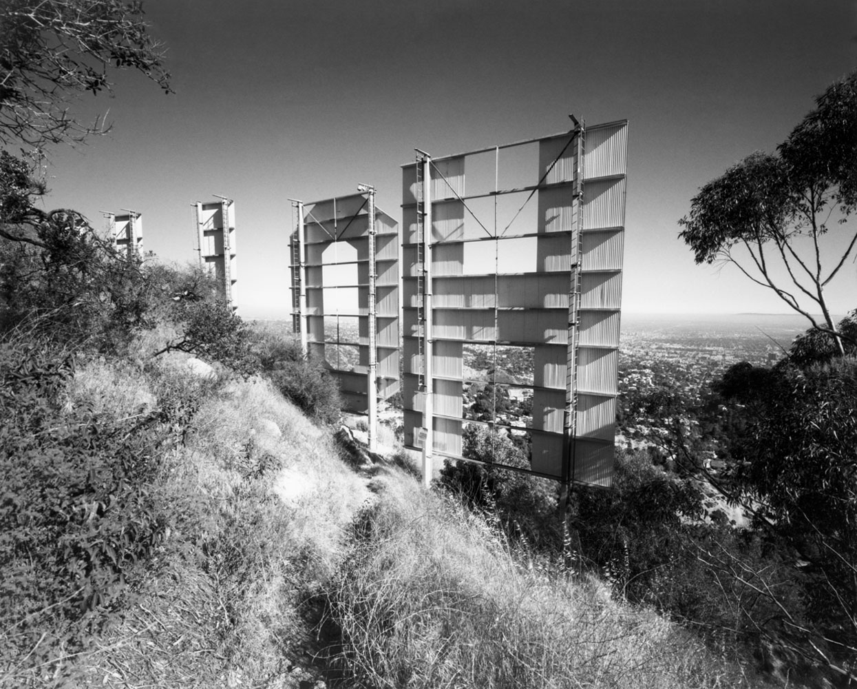 USA. Los Angeles, California. 2008. Back of Hollywood Sign.Contact email:New York : photography@magnumphotos.comParis : magnum@magnumphotos.frLondon : magnum@magnumphotos.co.ukTokyo : tokyo@magnumphotos.co.jpContact phones:New York : +1 212 929 6000Paris: + 33 1 53 42 50 00London: + 44 20 7490 1771Tokyo: + 81 3 3219 0771Image URL:http://www.magnumphotos.com/Archive/C.aspx?VP3=ViewBox_VPage&IID=2K7O3RTV98EL&CT=Image&IT=ZoomImage01_VForm
