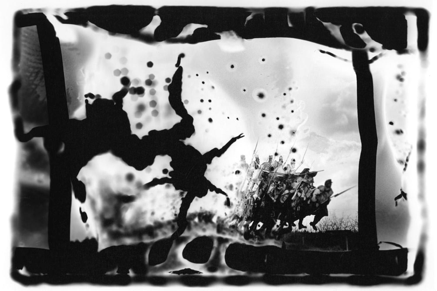 Untitled #2,  2007; from the series Burnt Negatives. This is a series of images of the decaying communist monuments in Memento Park in Budapest, burned by the artist with cigars, matches and other small embers six years after they were taken in 2001. The bubbling adds a layer of sculptural three-dementionality, offering the artist the opportunity to refocus on a different plane in the darkroom.