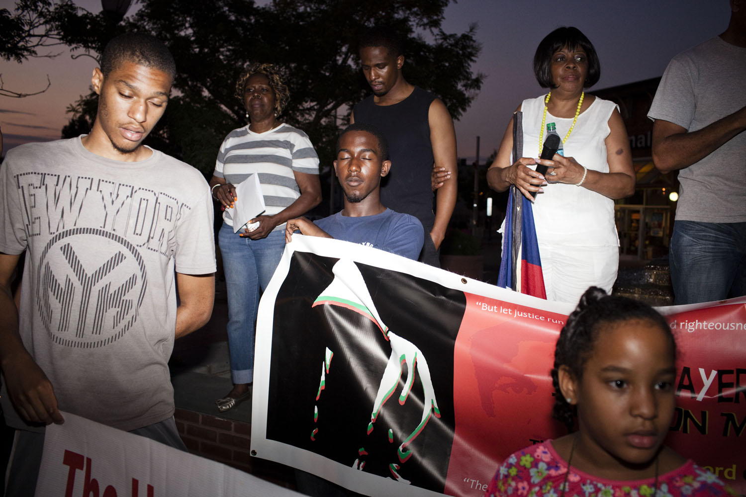 July 16, 2013: Jersey City, NJ -  People gather at the Hub Shopping Center on Martin Luther Drive for a ralling in memory of Trayvon Martin.