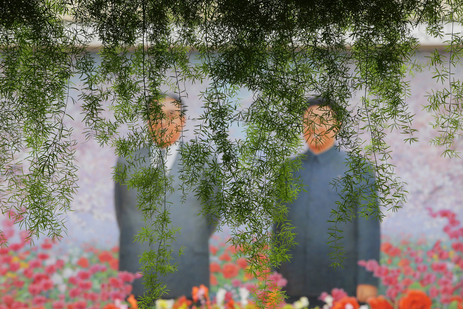 A painting featuring late North Korean leaders Kim Jong-il and Kim Il-sung is pictured at the Kimilsungia-Kimjongilia exhibition hall in Pyongyang