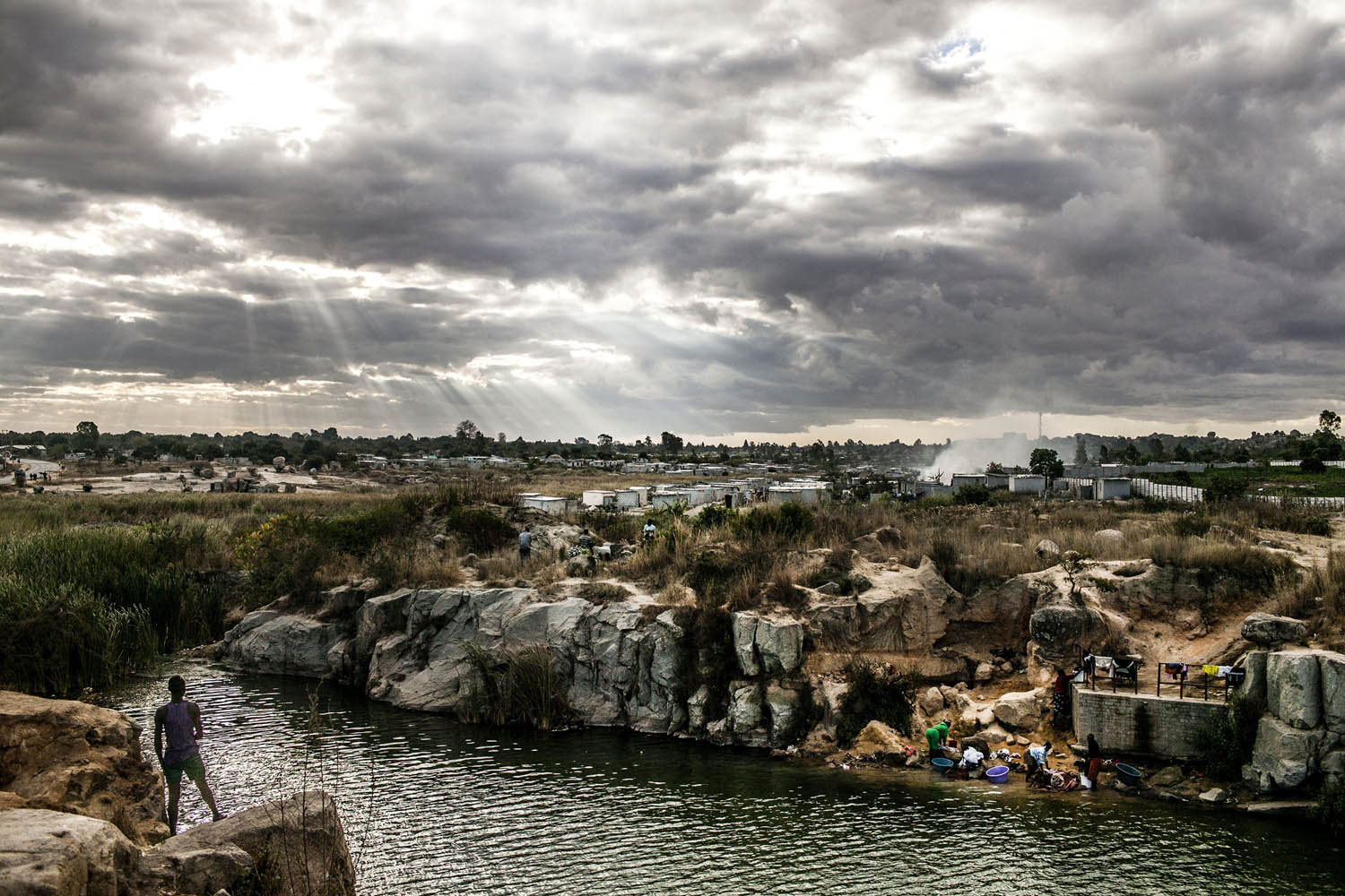 People at a quarry in Epworth, a suburb in Harare, Zimbabwe.