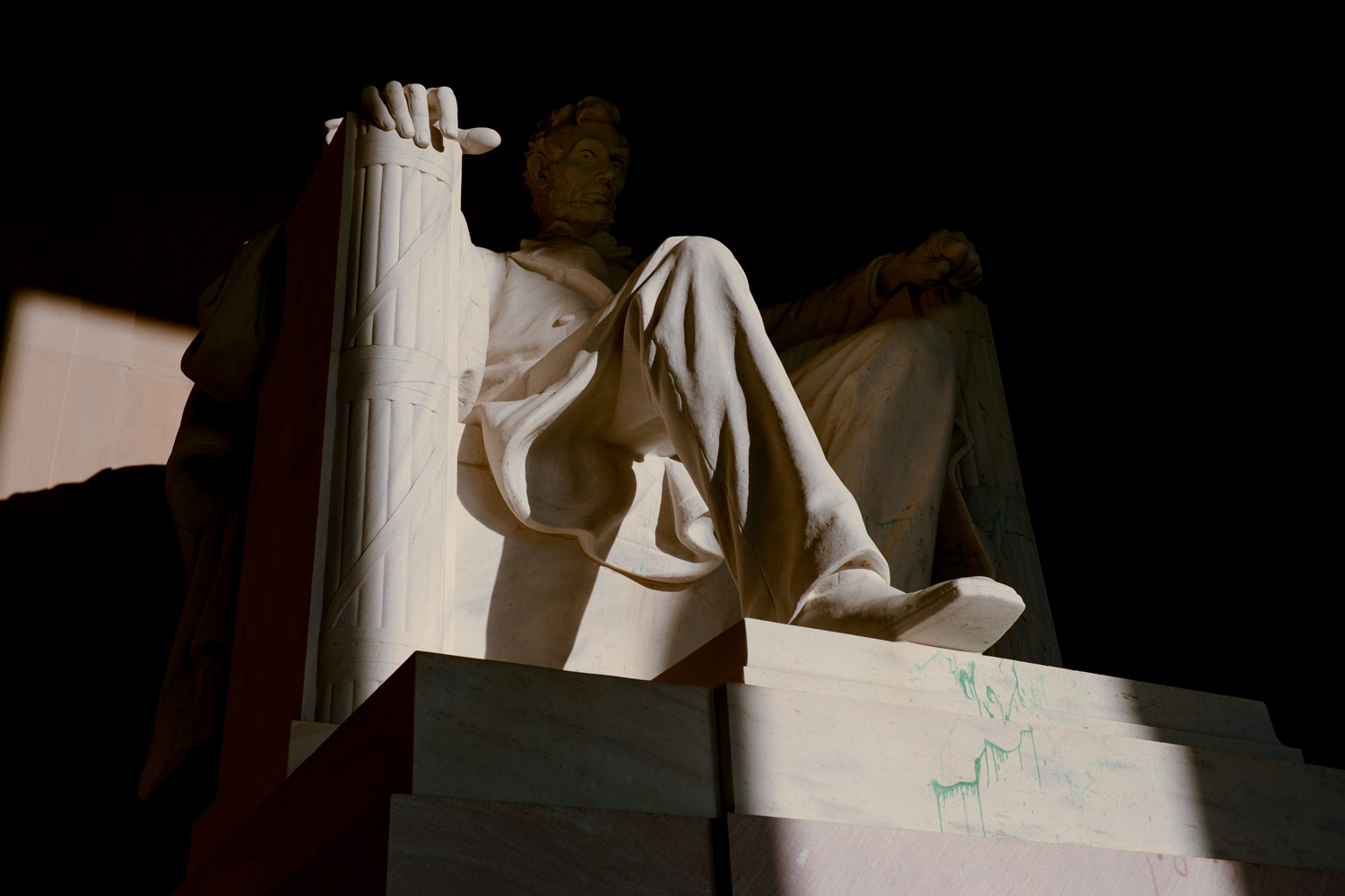 July 29, 2013. Splotches of green paint are still visible on the Lincoln Memorial after someone defaced the monument in Washington.