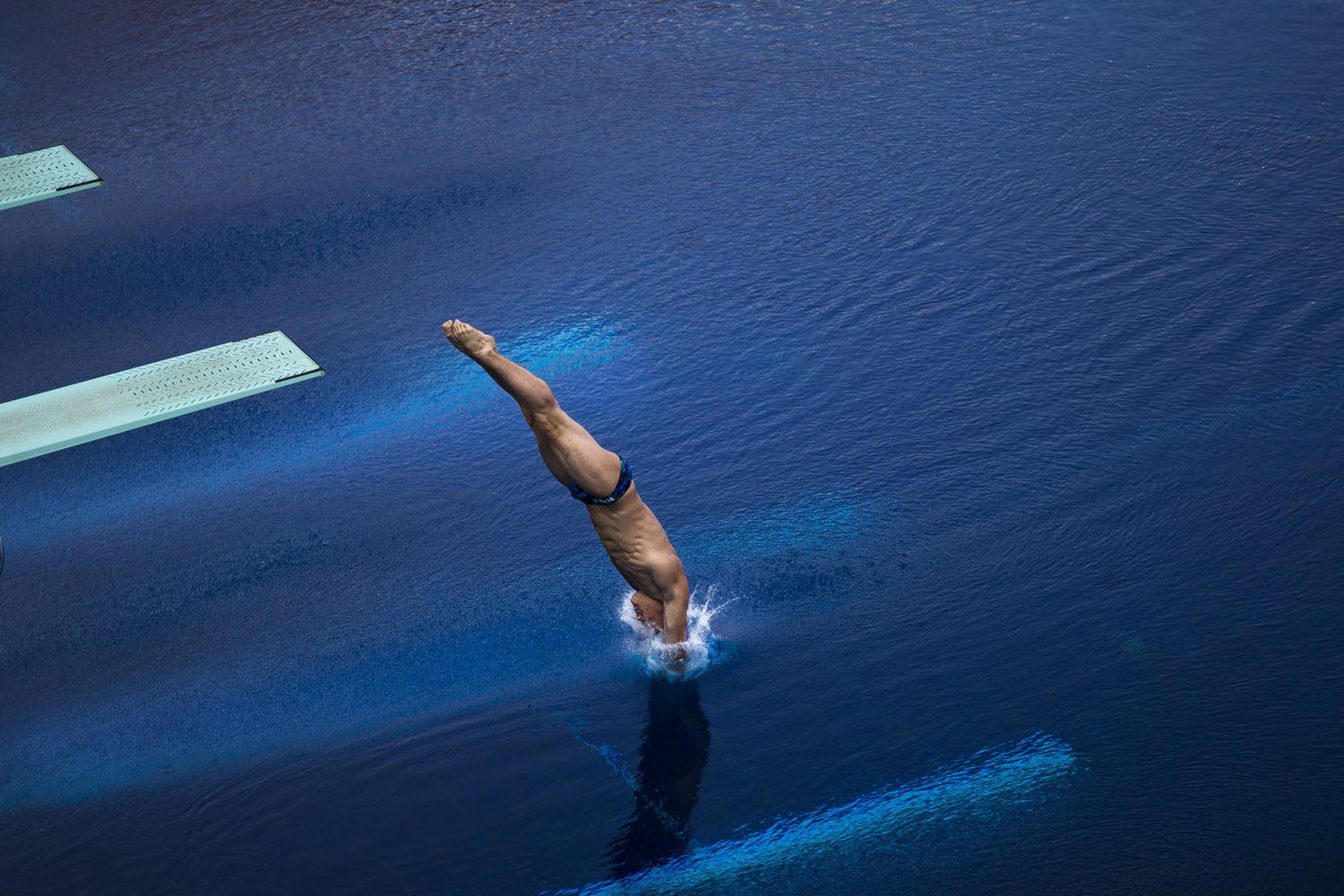July 26, 2013. Silver medalist Evgeny Kuznetsov from Russia performs during the men's 3-meter springboard final at the FINA Swimming World Championships in Barcelona, Spain.