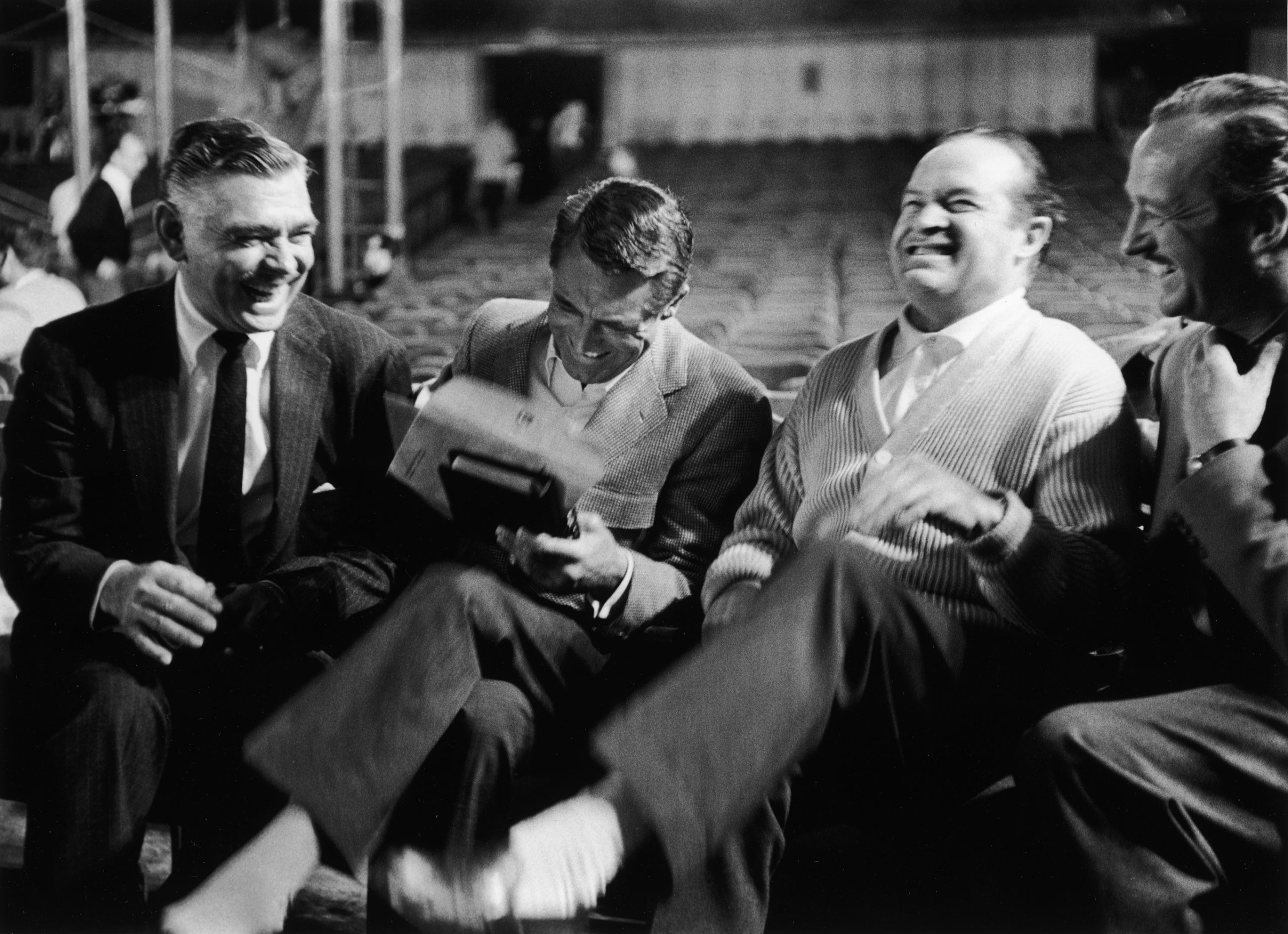 Clark Gable, Cary Grant, Bob Hope and David Niven laugh heartily together during a break from rehearsals for the 30th annual Academy Awards show in Los Angeles, 1958.