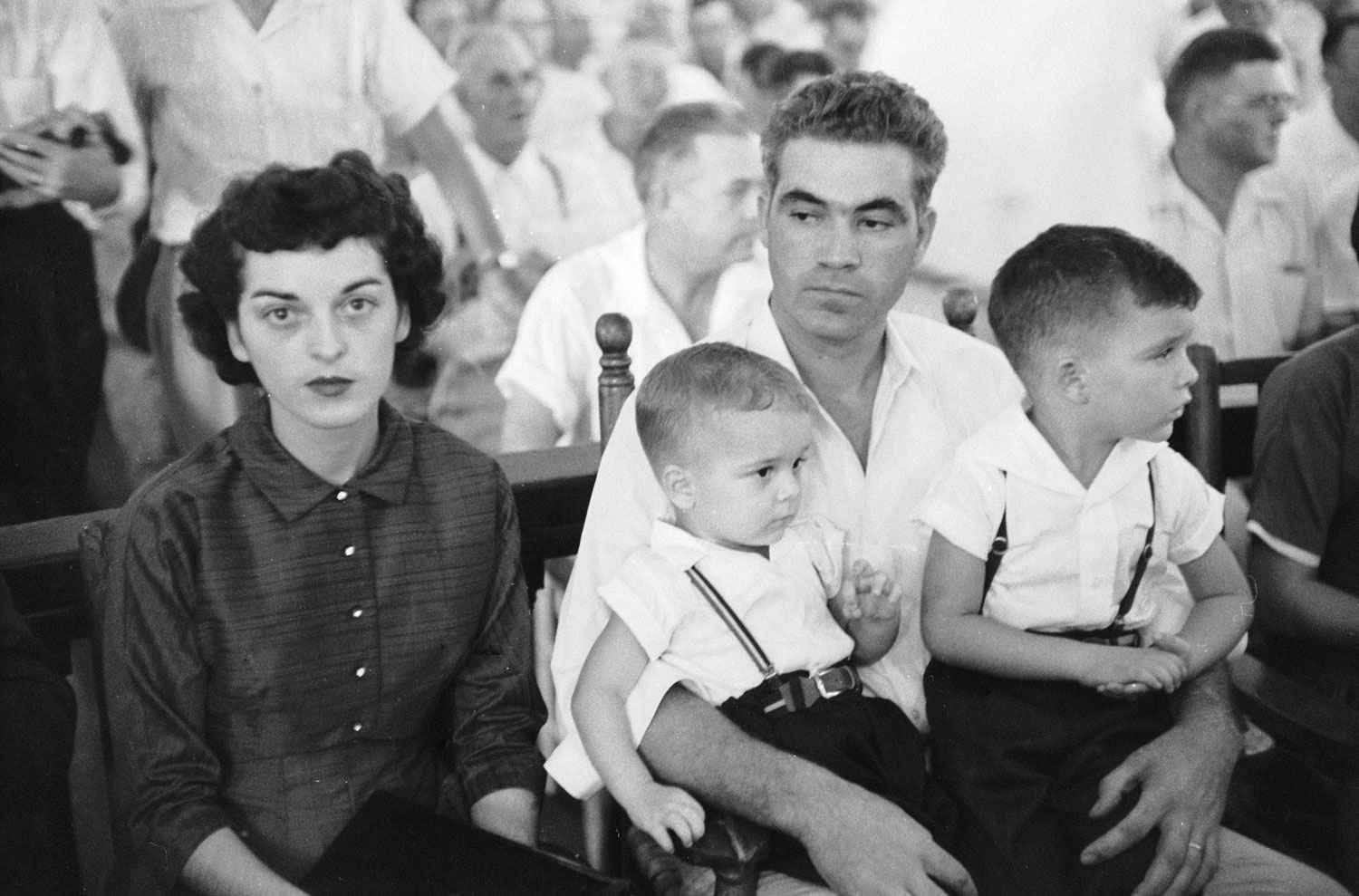 Defendant Roy Bryant sits with his wife Carolyn and their children during his trial for the kidnapping and murder of Emmett Till.