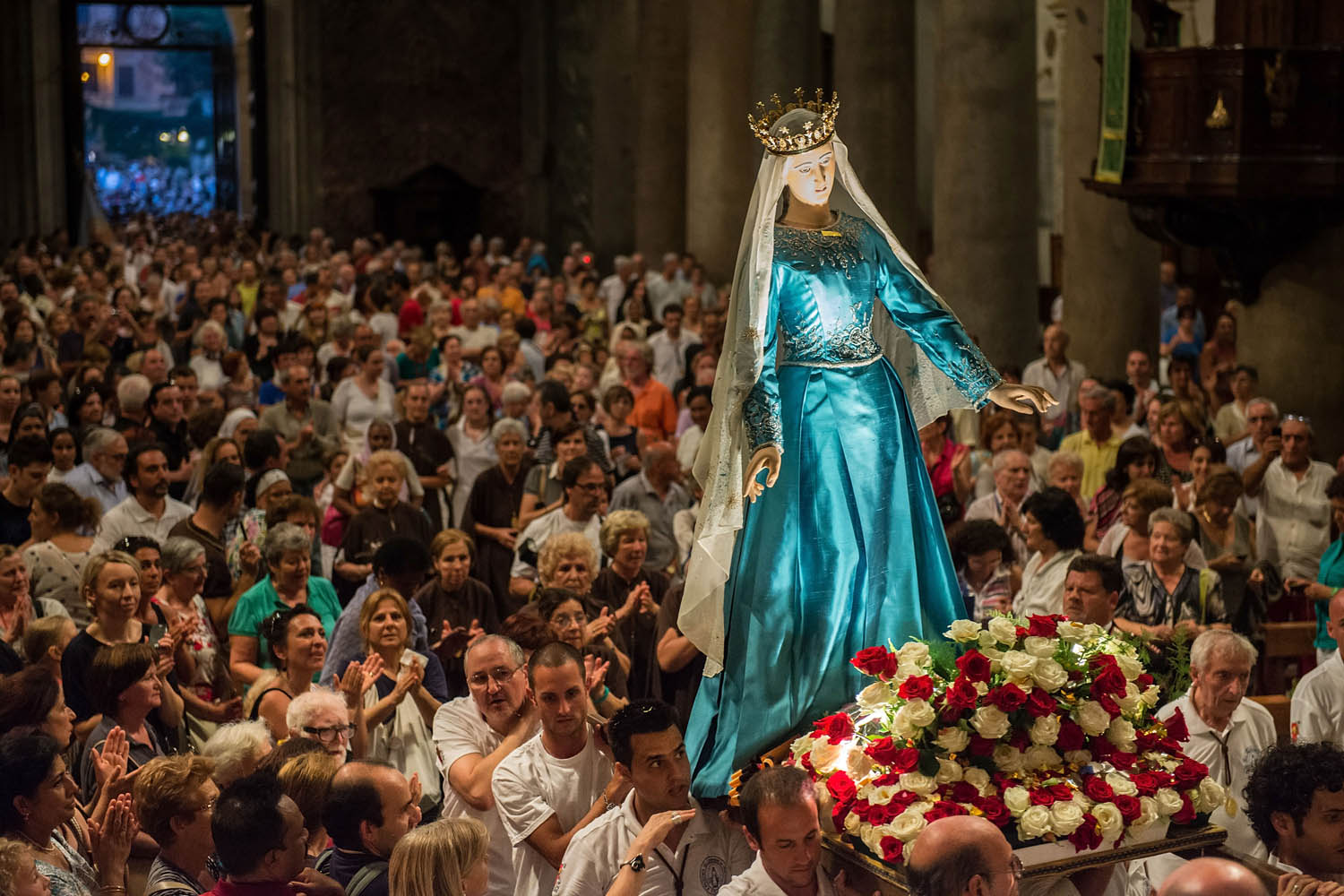 July 28, 2013. The statue of the 'Madonna della Fiumarola' (or Madonna del Carmine) is carried in procession inside the Basilica of Santa Maria Maggiore during the closing of the annual 'Festa de Noantri' in the Trastevere district in Rome.