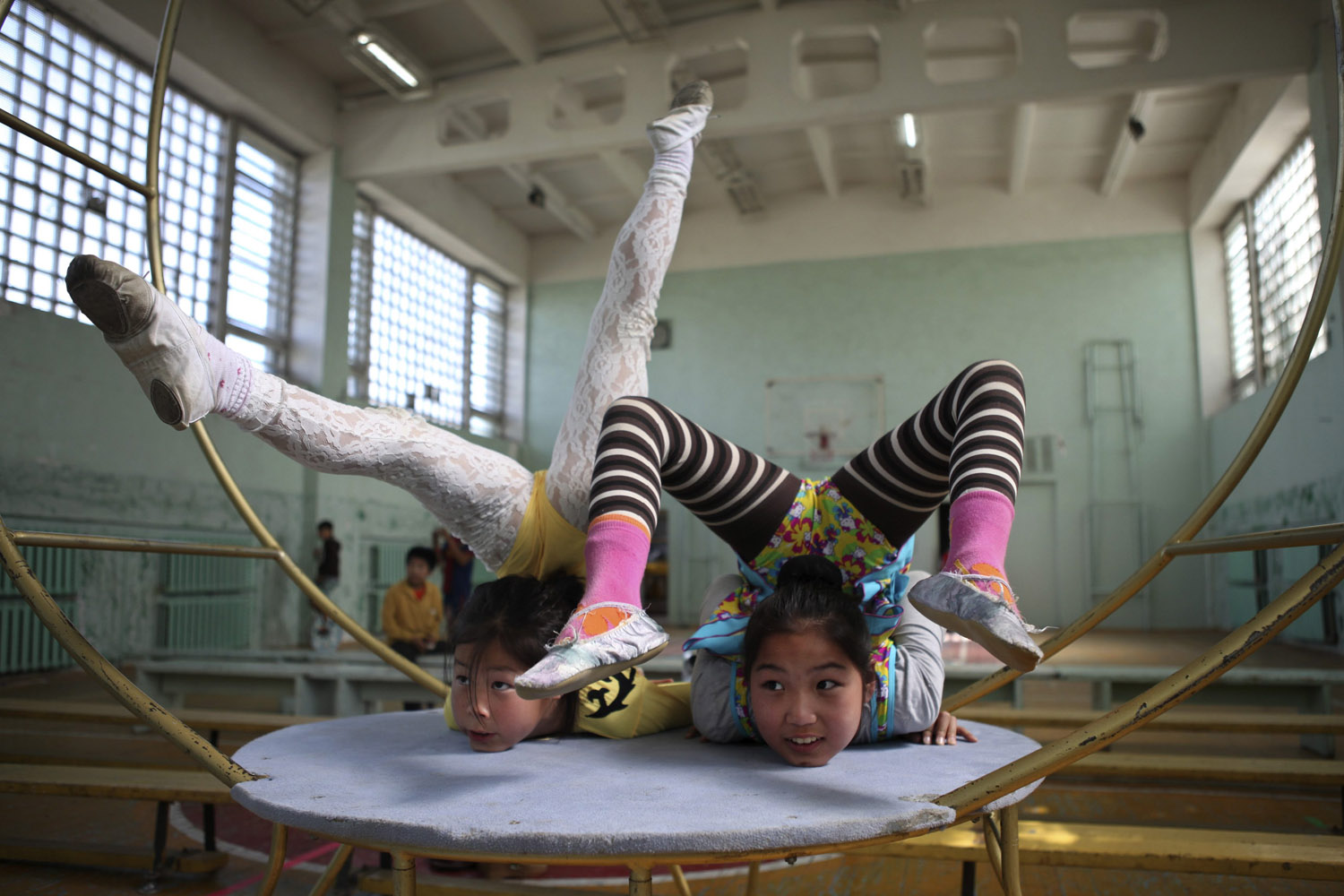 Members of Shonkhoodoi Circus practise in a gymnasium in Darkhan