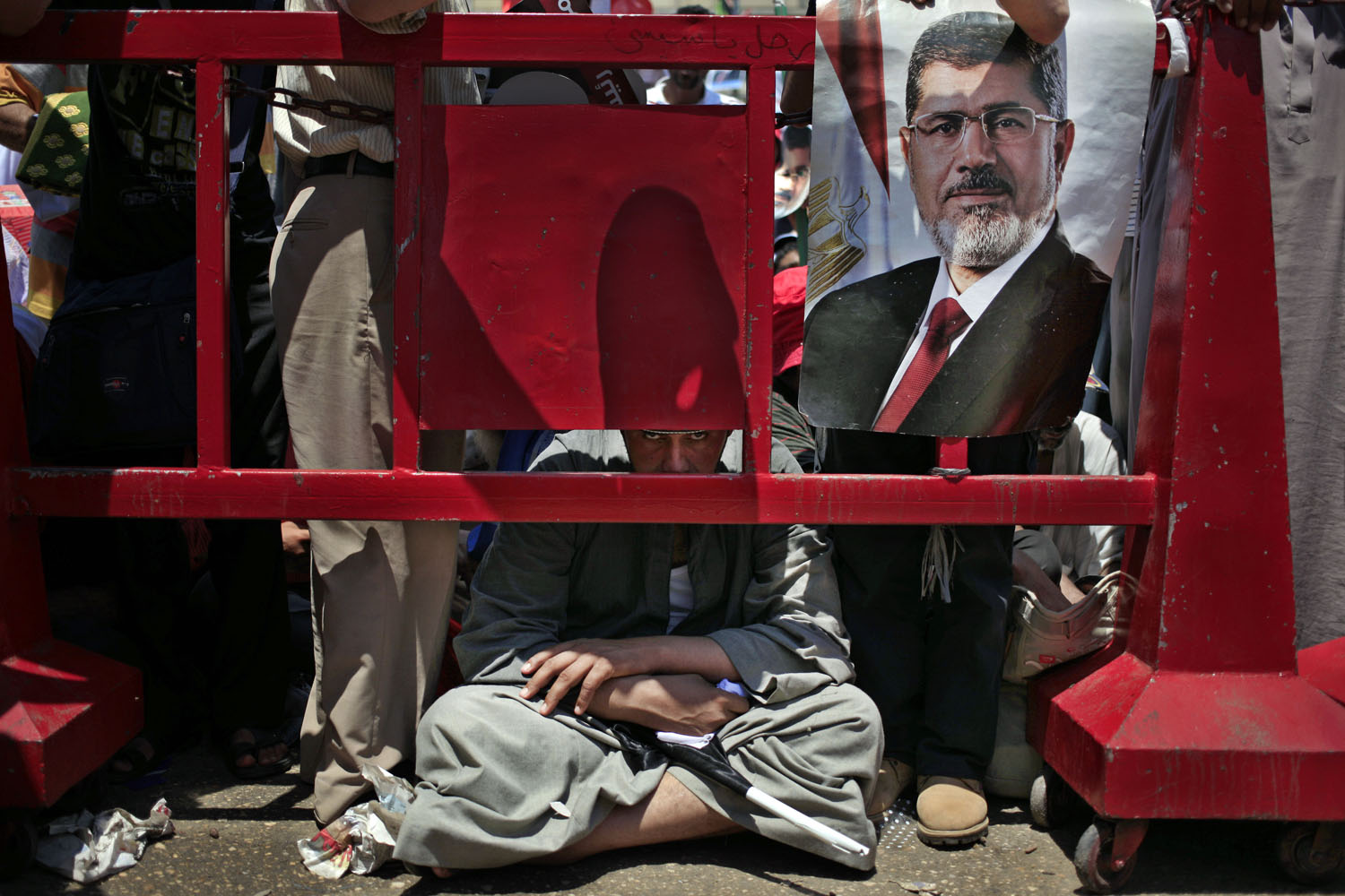 July 26, 2013. Supporters of Egypt's ousted President Mohammed Morsi attend the Friday prayer during a protest at Nasr City, where protesters have installed their camp and hold their daily rally, in Cairo.