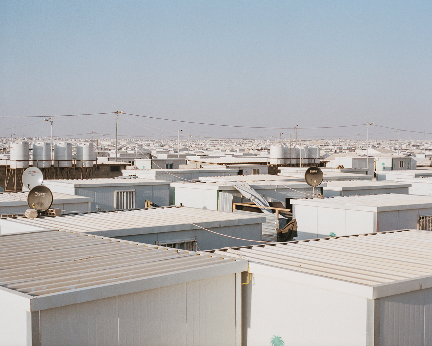 A view of Zaatari refugee camp from atop one of the approximately 16,500 containers that are being used as makeshift homes. The remaining 11,000 tents are being replaced before winter so that the entire camp will be made up of the containers.