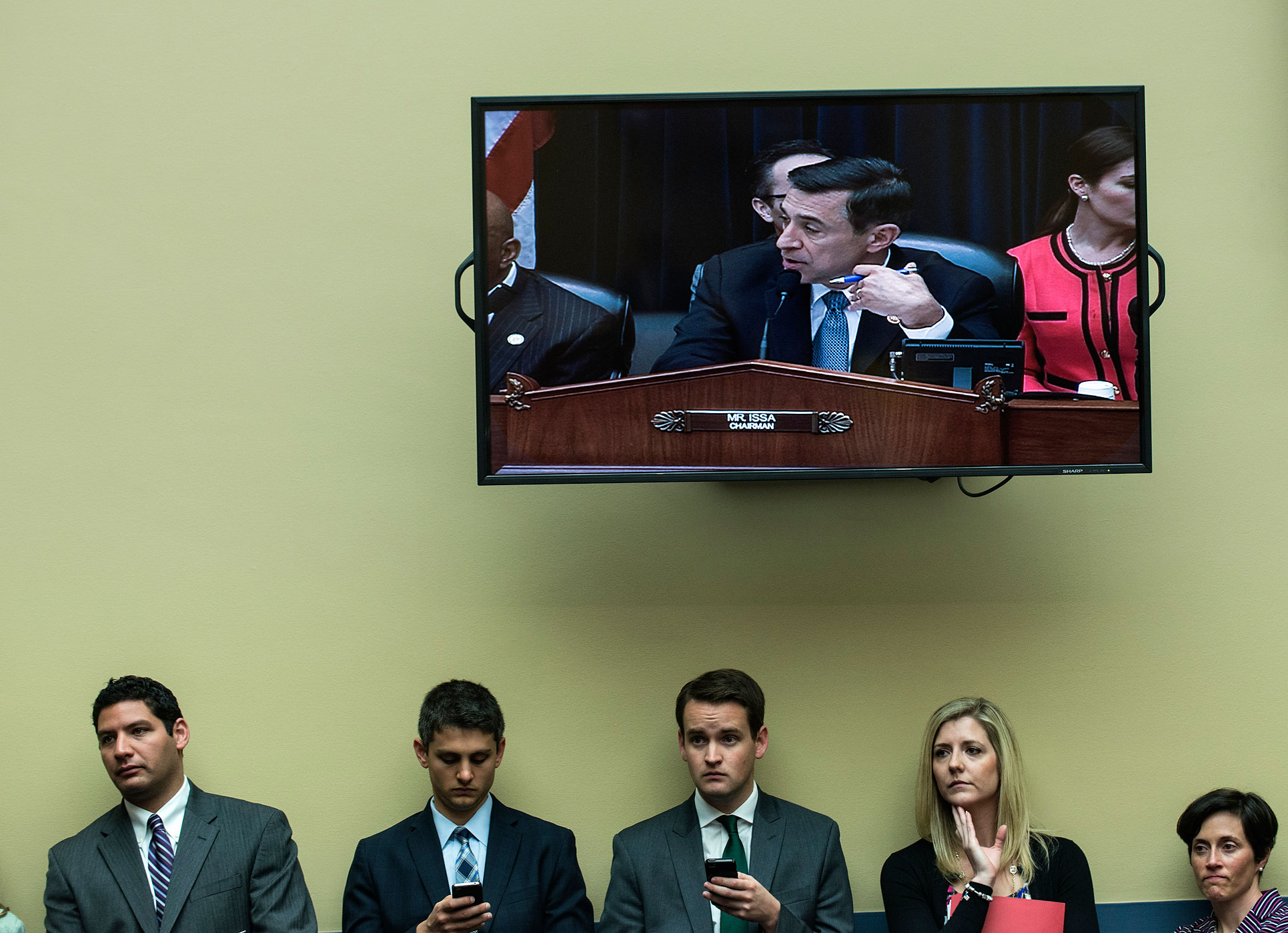 May 8, 2013. Committee Chairman Rep. Darrell Issa is seen on a screen speaking during a hearing of the House Committee On Oversight and Government Reform on Capitol Hill in Washington. The hearing investigated the events and response to a 2012 attack on one of the United States's diplomatic compounds in Benghazi, Libya.