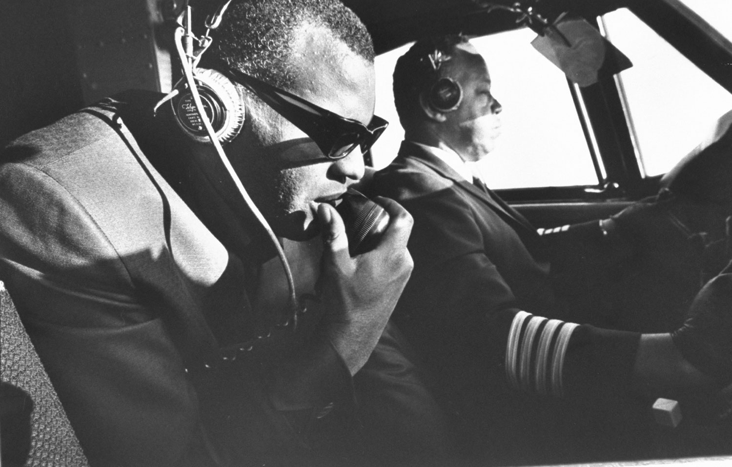 In his 50-seat private plane, Ray talks to a control tower. He likes to sit up in the co-pilot's seat and knows so much about the operation of the plane that, in an emergency, he could take over. 'That would really be flying blind, baby.'