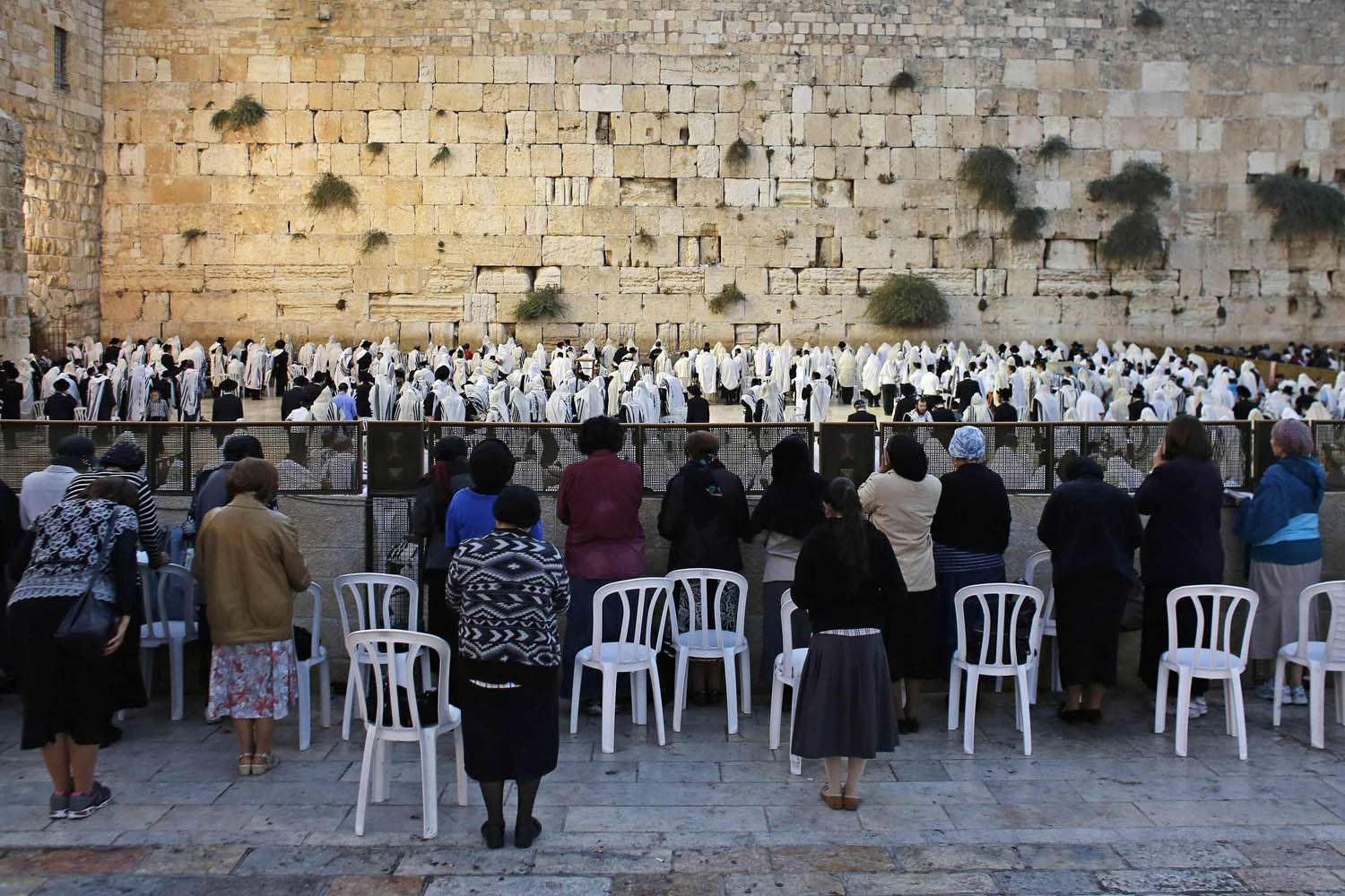 Female Jewish worshippers pray at the Western Wall in Jerusalem's Old City