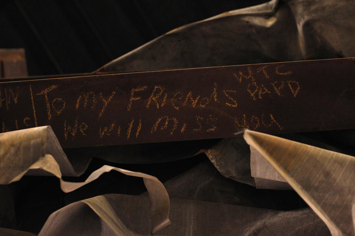 A message is seen on the bottom of the "Cross" which is displayed in The National September 11 Memorial and Museum under construction at the World Trade Center site in New York