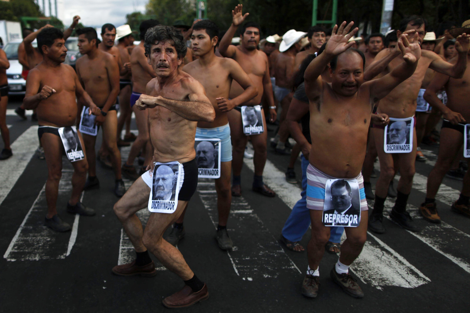Peasants dance in their underwear during a demonstration to demand an audience with the Federal District authorities in Mexico City