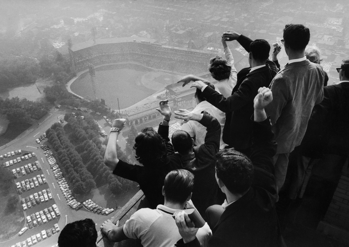University of Pittsburgh students cheer wildly from atop the school's Cathedral of Learning as they watch the Pittsburgh Pirates win their first World Series in 35 years (against the Yankees), Oct. 13, 1960.