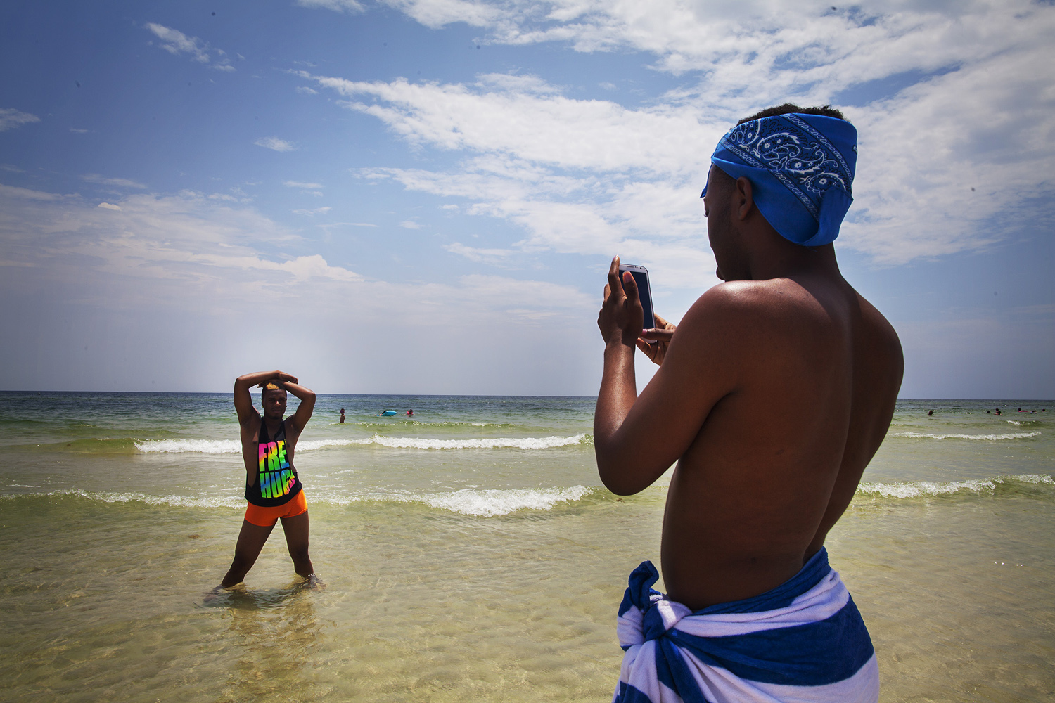 Kentrell poses for a photo on a trip to the beach with teammate Jerel. The two have emerged as leaders and role models in the group. Kentrell, as team captain, holds a great deal of authority, but Jerel, who the group also refers to as  the mom,  often provides the kind of guidance that can often be identified as parental in nature.