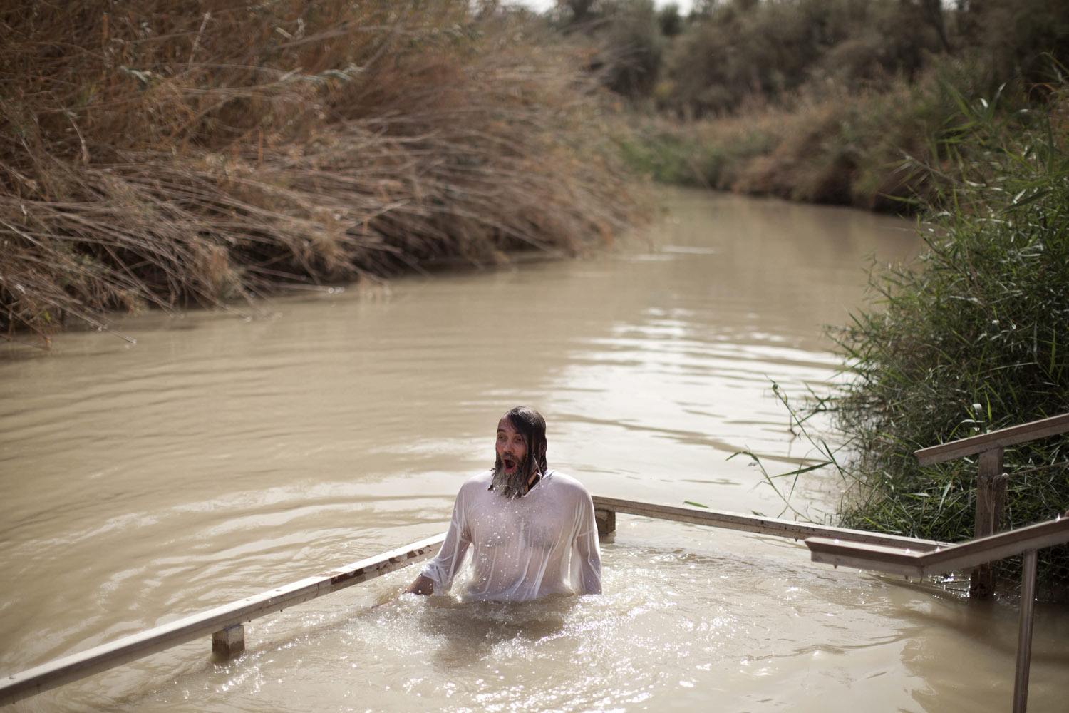 Orthodox pilgrims baptized in the Jordan River