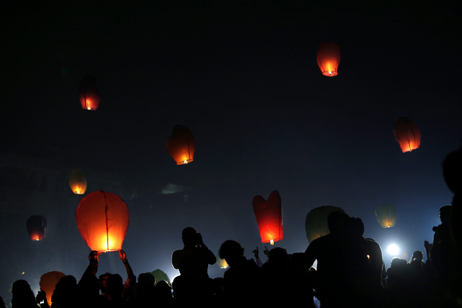 Oct. 30, 2013.  Members of the global youth organization AIESEC celebrate the Diwali festival with glowing sky lanterns to promote eco friendly Diwali in Calcutta, eastern India.