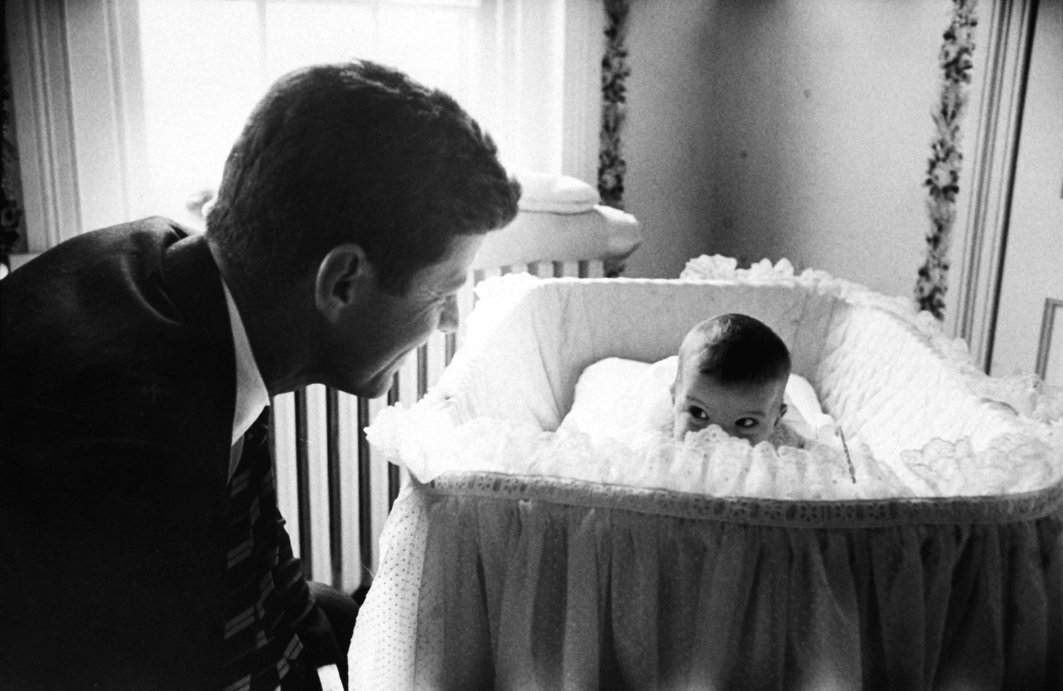 John Kennedy with his daughter Caroline in 1958.
