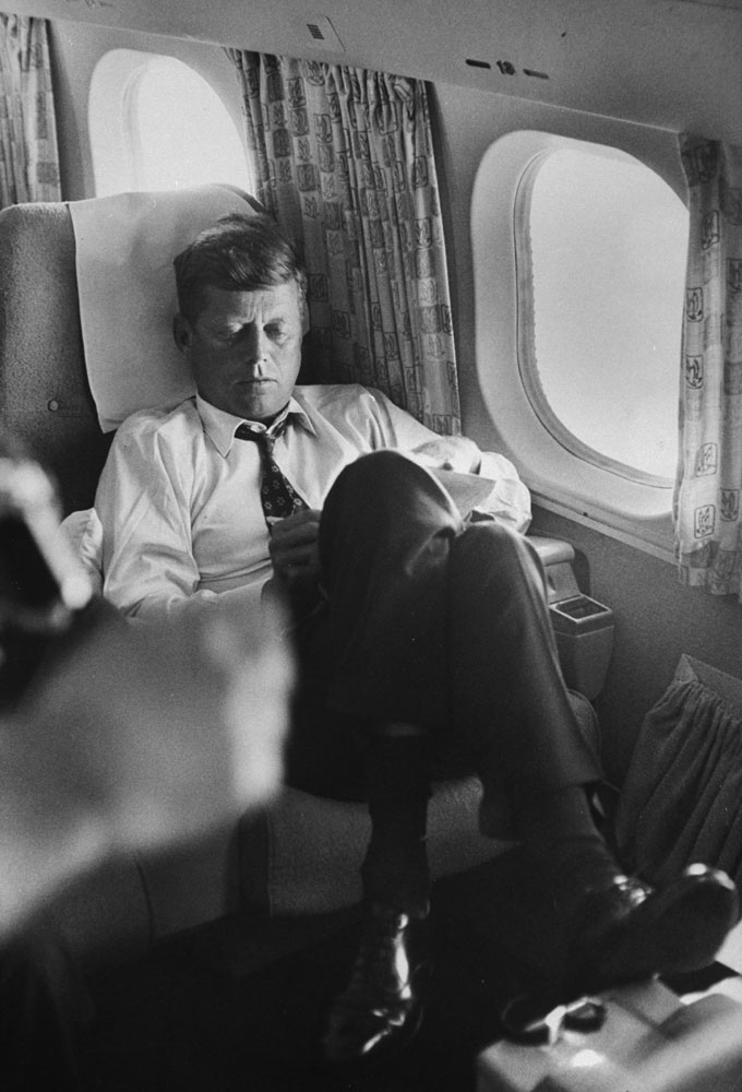 Sen. John F. Kennedy on a private plane during his presidential campaign, 1960.