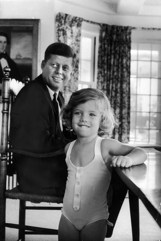 Sen. John Kennedy with his young daughter Caroline at home after he was named the Democratic Party presidential candidate in 1960.