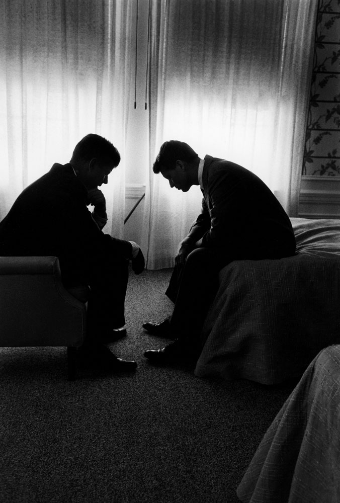 John and Robert Kennedy confer in a Los Angeles hotel suite during the 1960 Democratic National Convention.