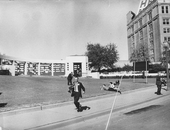 The scene at Dealey Plaza in Dallas in the moments after John Kennedy was shot, Nov. 22, 1963.