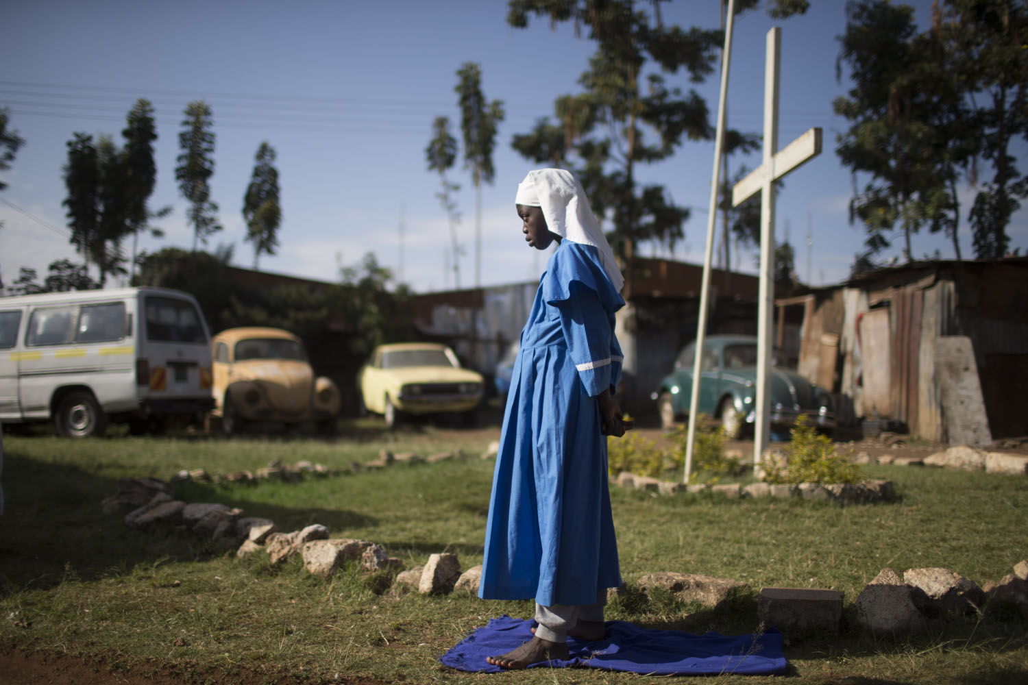 Sept. 29, 2013. A girl prays as Kenyans hold a church service for the victims of the Westgate Shopping Center attack in Nairobi, Kenya.