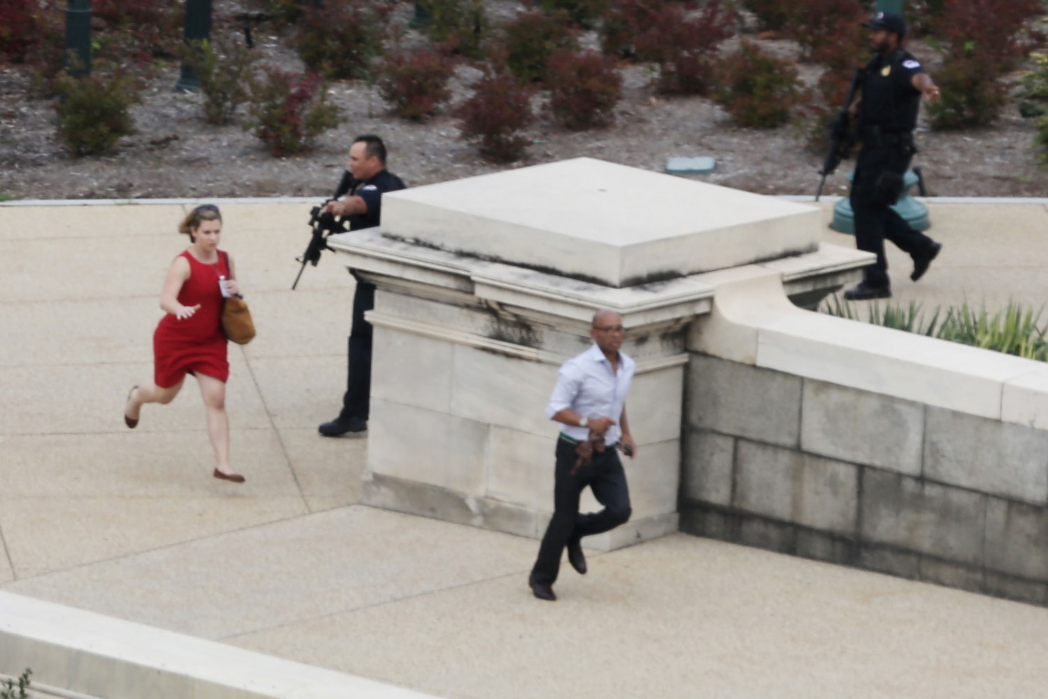 Oct. 3, 2013. Police close in on the U.S. Capitol as people run for cover after reports of a shooting on Capitol Hill in Washington, DC. The Capitol and the White House were placed on lockdown after an  active shooter  situation was reported.