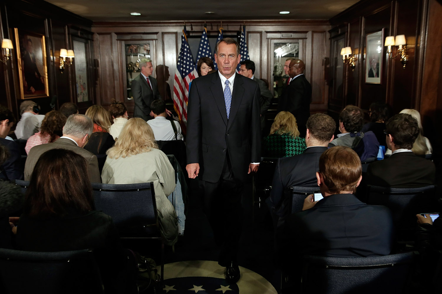 Oct. 23, 2013. U.S. Speaker of the House John Boehner (R-OH) (C) leaves a Republican leadership press conference in Washington.