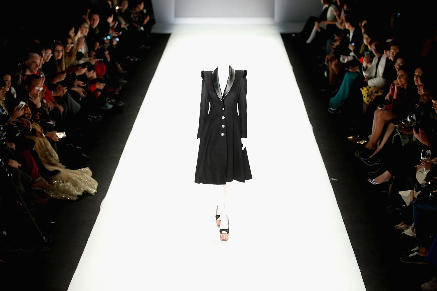 Oct. 29, 2013. An overexposed image shows a model showcasing designs on the runway at Hu Sheguang Haute Couture Collection show during Mercedes-Benz China Fashion Week Spring/Summer 2014 at 751 D-PARK Workshop in Beijing, China.