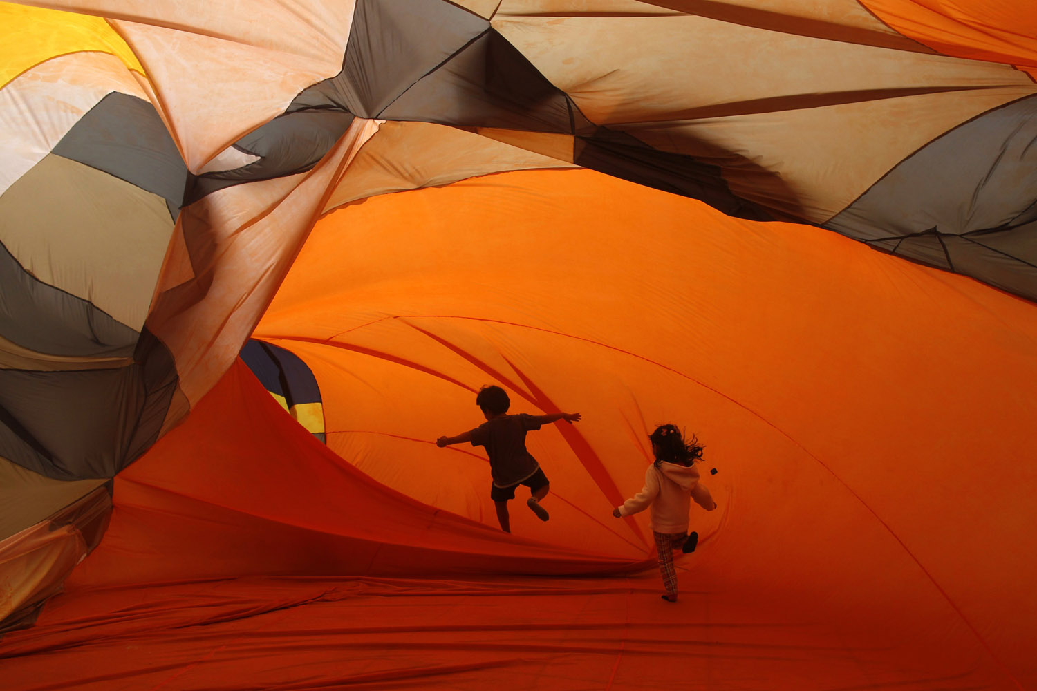 Sept. 29, 2013. Children play inside inflatable installations at the Casa Daros museum in Rio de Janeiro.