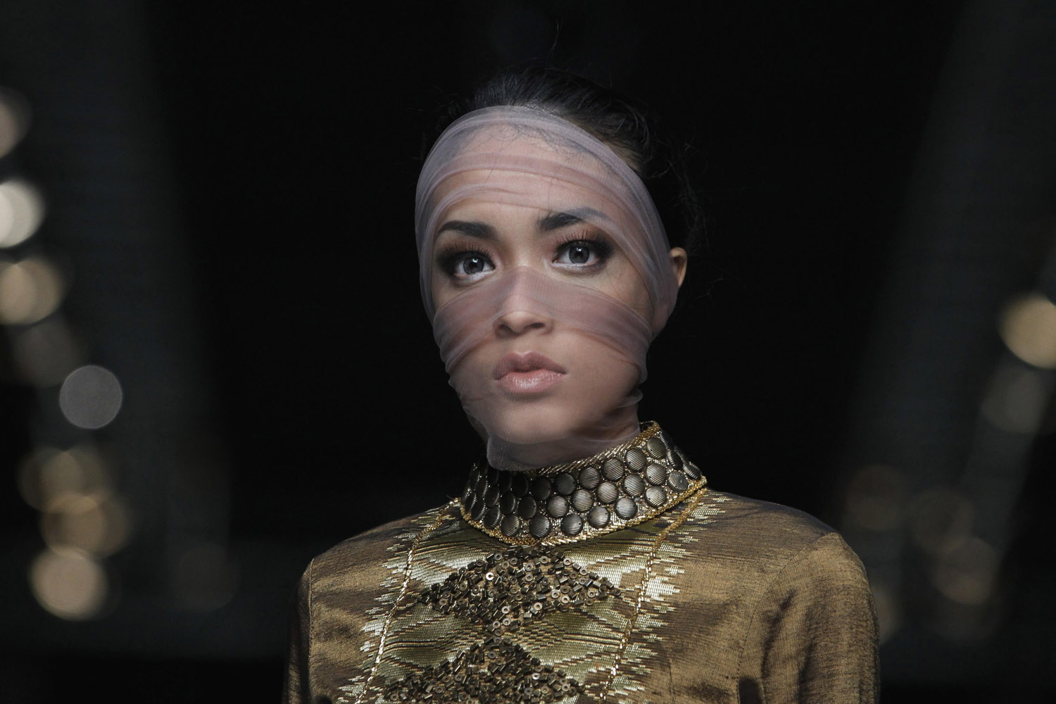 Model presents a creation by Muslim clothing designer Feny Mustafa during a Fashion Week show in Jakarta